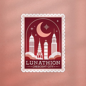 Peut inclure: Un autocollant blanc avec un fond rouge et une lune croissante blanche. L'autocollant repr&eacute;sente une ville avec cinq b&acirc;timents et le texte "LUNATHION CRESCENT CITY".
