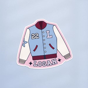May include: A sticker featuring a light blue varsity jacket with white sleeves. The jacket has a red and white striped collar and cuffs, with the number "22" and the letter "L" on the front. The name "LOGAN" is written below the jacket.