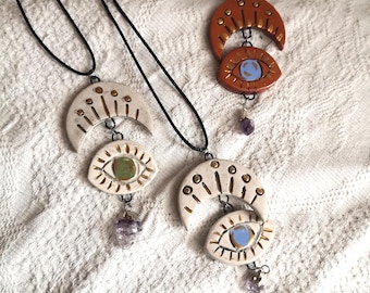 Handmade Ceramic Evil Eye Pendant Necklace with Amethyst Stone.