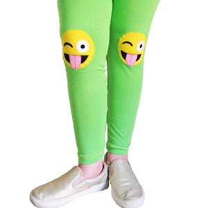 Lime green cotton lycra kids leggings with yellow emoji with the tongue sticking out. sizes 2T to 10 years old.