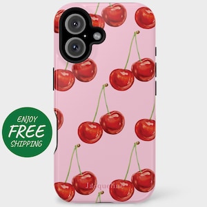 May include: A pink phone case featuring a pattern of red cherries with green stems. The case has a black camera module and the name "Jacqueline" printed on the bottom. The case is designed to fit a smartphone.