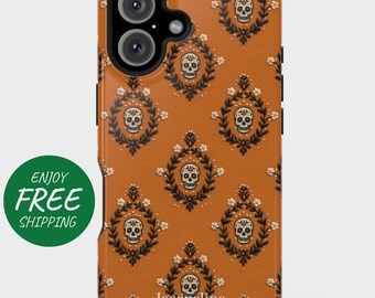 May include: A phone case with a repeating pattern of skulls within floral wreaths on an orange background. The case has a black camera module and side buttons. The name "Jacqueline" is printed at the bottom. A green circle with the words "Enjoy Free" is on the left.