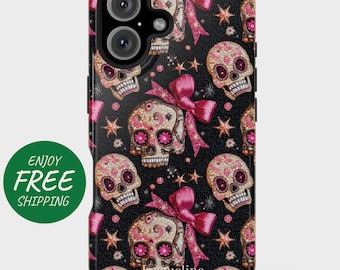 May include: Black phone case featuring a repeating pattern of sugar skulls with pink and gold embellishments, pink bows, and stars. The skulls have pink flower accents in the eye sockets. The case has a glossy finish.