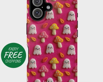 May include: A phone case with a pink background featuring a pattern of white ghosts, colorful mushrooms, and orange leaves. The case has a black camera module and the name "Jacqueline" printed at the bottom. The words "Enjoy Free Shipping" are on a green circle.