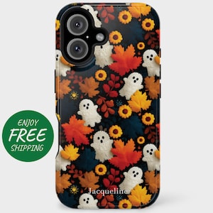May include: A phone case featuring a Halloween-themed design. The case is adorned with white ghost figures, orange and yellow autumn leaves, and yellow sunflowers against a dark blue background. The name "Jacqueline" is printed at the bottom.