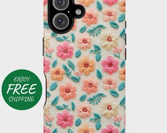 May include: A phone case featuring a floral design with pink, peach, and cream-colored flowers and teal leaves. The case has a textured appearance and the name "Jacqueline" is printed on the bottom. The phone case has a black camera and side buttons.