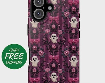 May include: A purple phone case with a repeating pattern of white ghosts, pink bows, and roses. The case has a vertical striped background and the name "Jacqueline" at the bottom. The phone case has a dual camera.