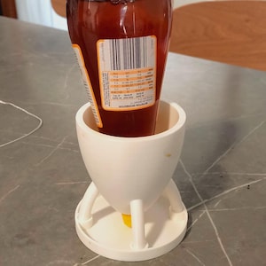 Upside down bottle holder