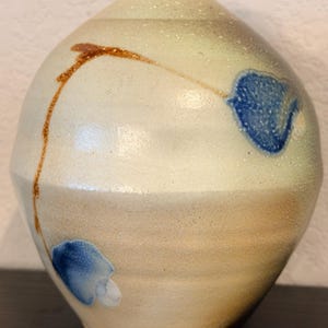 Signed Beige and Blue, Art Pottery Vase with Abstract Flowers, 6.25” Tall, 4.5” Wide