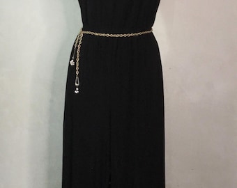 Mono negro vintage de los años 70, estilo disco.