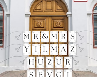May include: A printable wedding banner with the words "MR & MRS YILMAZ HUZUR SEVGI MUTLULUK" in black text on white squares with floral designs. The banner is strung with scissors on each end.