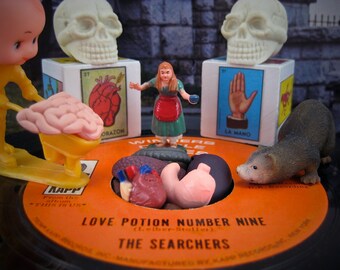 Bedelia builds a better boyfriend — original, custom framed surreal photograph by John Purlia