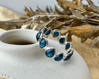 London Blue Topaz Ring: Sterling Silver Eternity Band, December Birthstone