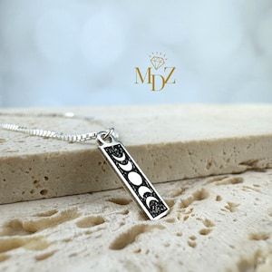 Collar de fases lunares en plata de ley: joyería minimalista con barra celestial