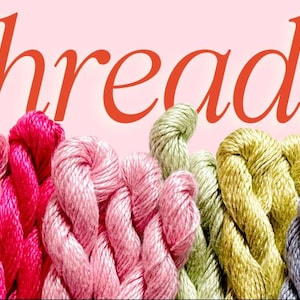 May include: A close-up of colourful embroidery threads in shades of pink, green, and blue. The word "threads" is written in red script across the top of the image, set against a pink background. Suitable for craft projects.