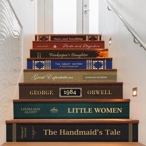 May include: A set of decorative stair treads featuring book spines with titles such as "Sense and Sensibility", "Pride and Prejudice", "Firekeeper's Daughter", "The Great Gatsby", "Great Expectations", "1984", "Little Women", and "The Handmaid's Tale".