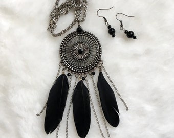 Medallion pendant with feathers and chains necklace and earrings set