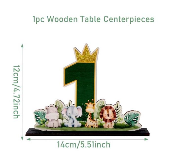 May include: A wooden table centerpiece featuring a dark green number one topped with a gold glitter crown, surrounded by illustrations of a hippo, elephant, giraffe, and lion. The item measures 4.72 inches in height and 5.51 inches in width.
