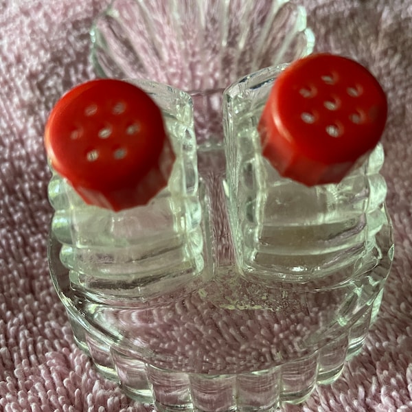 Vintage Red Top  Salt and Pepper Shakers with Holder  Clear with red tops .  1940's Era   Small size