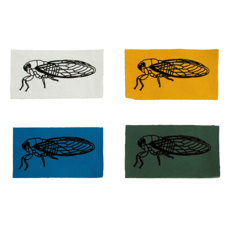 May include: Four fabric patches with a black silhouette of a cicada insect. The patches are in four different colors: white, yellow, blue, and green.