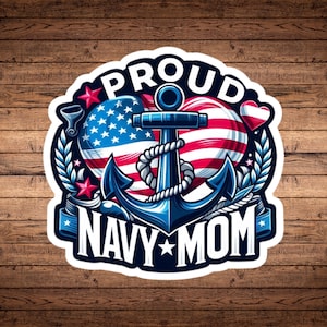 May include: A sticker with a patriotic design featuring a navy blue anchor, the American flag, and the words "PROUD NAVY MOM." The design includes stars, hearts, and laurel leaves, all set against a wooden background.