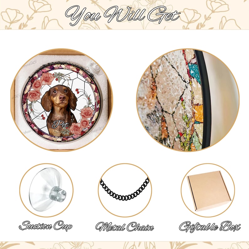 May include: A stained glass style round ornament featuring a brown and tan dachshund dog with pink roses and green leaves. The ornament comes with a metal chain, a suction cup, and a gift box.