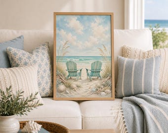 May include: A framed wall art print featuring a painting of two light blue Adirondack chairs positioned on a sandy beach facing the ocean, surrounded by tall beach grass and scattered seashells under a bright sky with soft white clouds.