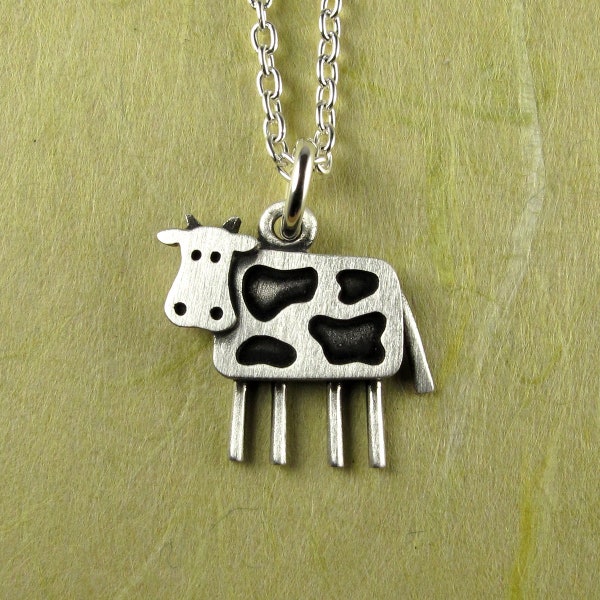 Tiny cow pendant / necklace - sterling silver