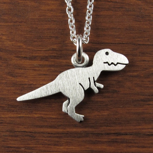 Tiny T-Rex dinosaur pendant / necklace - sterling silver