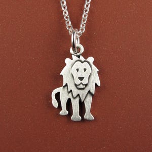 Tiny lion pendant / necklace - sterling silver