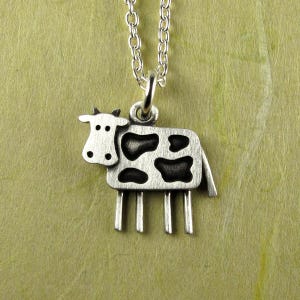 Tiny cow pendant / necklace - sterling silver