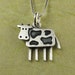 Tiny cow pendant / necklace 