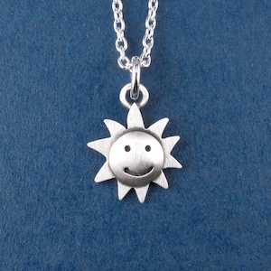 Tiny sun pendant / necklace - sterling silver