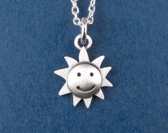Tiny sun pendant / necklace - sterling silver