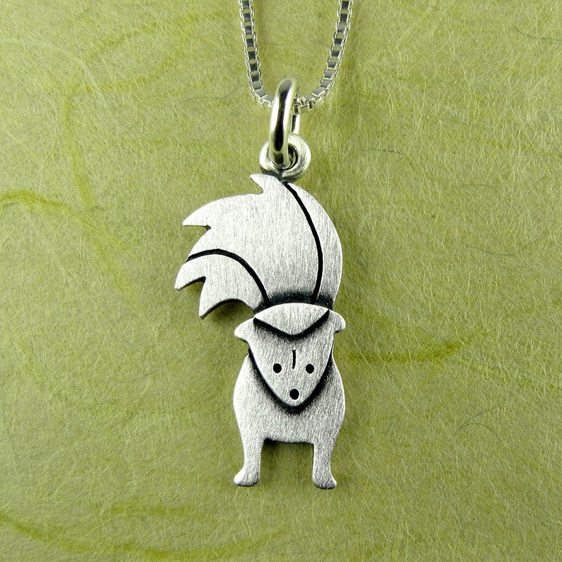 Tiny skunk pendant / necklace sterling silver image 1