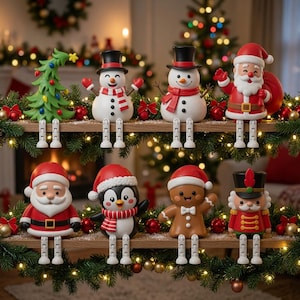 May include: A collection of eight Christmas-themed shelf sitters including a green tree, two snowmen, two Santa Clauses, a penguin, a gingerbread person, and a nutcracker. Each figure features dangling legs and is arranged on two wooden shelves.