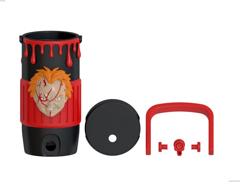 May include: A black cylindrical tumbler featuring a red silicone sleeve with a sculpted Chucky doll face, red dripping paint accents at the top, a black lid with a straw hole, and a detachable red handle with small red connector components.