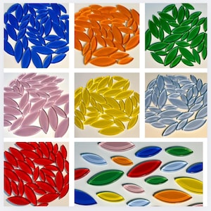 May include: A collection of colorful, leaf-shaped glass tiles in various colors, including blue, orange, green, pink, yellow, gray, and red. The tiles are arranged in circular patterns, with a final image showing a scattered arrangement.