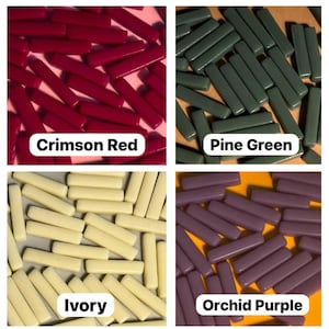 May include: Assortment of glass tiles in four colors: crimson red, pine green, ivory, and orchid purple. The tiles are rectangular and have a smooth, glossy finish.
