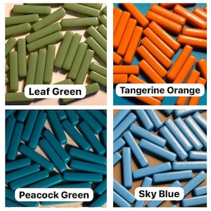 May include: Assortment of glass tiles in four colors: leaf green, tangerine orange, peacock green, and sky blue. The tiles are rectangular and have a glossy finish.