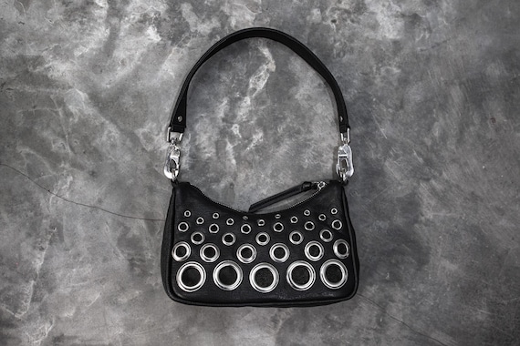 【MUCENT】CARBU BIG EYELET LEATHER MINI BAG Caju mini leather bag, black | Sportmax