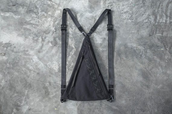 Katakana Sling Backpack and Sling Bag with multiple zipper pocket compartments in an urban streetwear minimalist design
