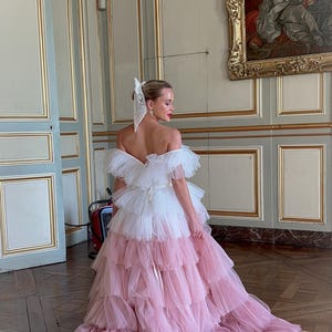 Women elegant wedding Dress made of tulle , with long train
