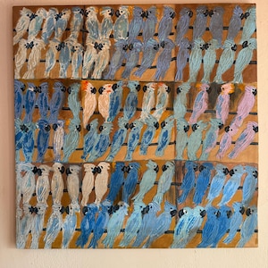 May include: An original painting featuring numerous stylized blue birds perched on horizontal lines against a brown background. The birds vary in shades of blue, with some having touches of pink and orange. The artwork is a square format.