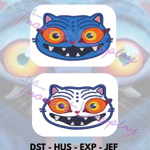 May include: Two embroidered cat face designs. One is blue with orange eyes and teeth, the other is white with orange eyes and teeth. The text at the bottom reads: DST - HUS - EXP - JEF PES - VIP - VP3 - XXX.