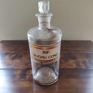 May include: A rustic wooden sign with the text "Welcome to our porch" in white lettering. The sign features a distressed finish and a simple, inviting design, perfect for outdoor decor.