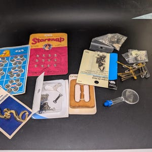 Syparti - Tryckknappar - Märke - Krokar - S-knappskrok - Spänneögla - Lite vintage - Starsnap - Streamline - La Mode