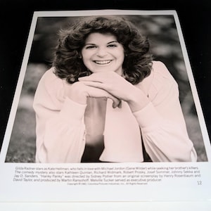 May include: A black and white publicity photo of Gilda Radner, an American actress and comedian, with a caption describing her role in the film "Hanky Panky".