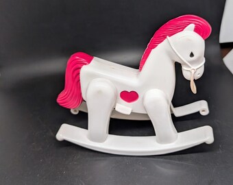 Plastic Rocking Horse - Pink and White with Pink Heart in middle - Has rope that hangs from halter