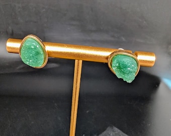 Green Stone in Gold Ovalish type Stud Earrings